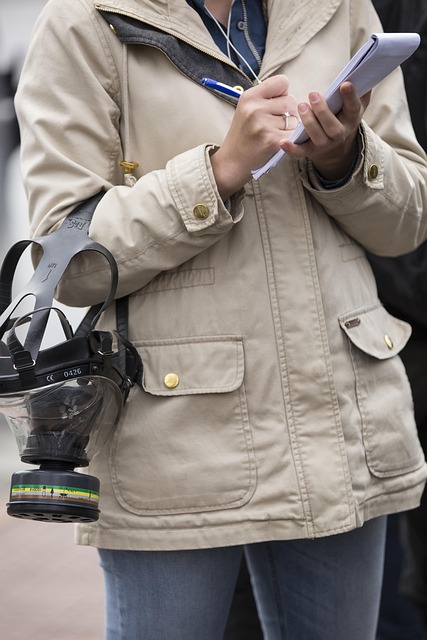 A journalist taking notes
